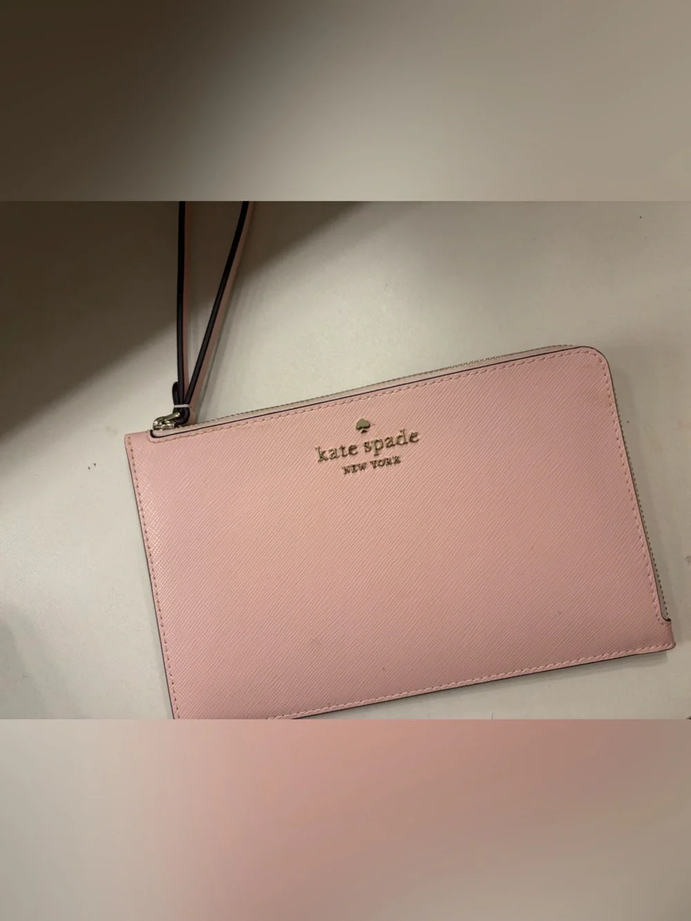 kate spade Light Pink Leather Wristlet with Gold Logo
